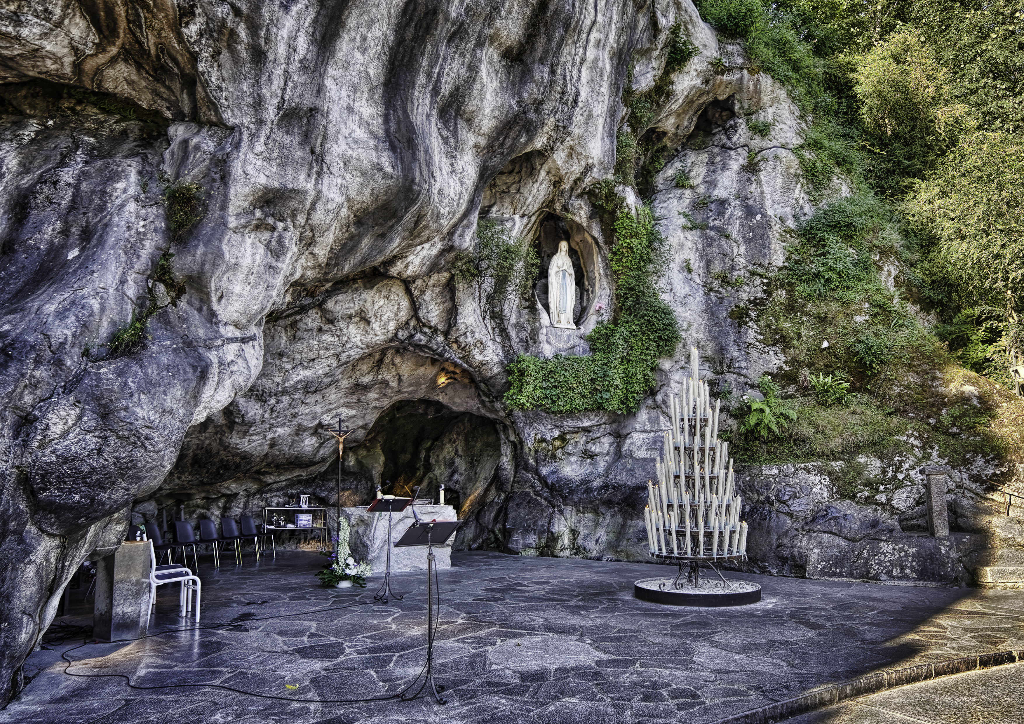 What is the apparition and message of Our Lady of Lourdes?