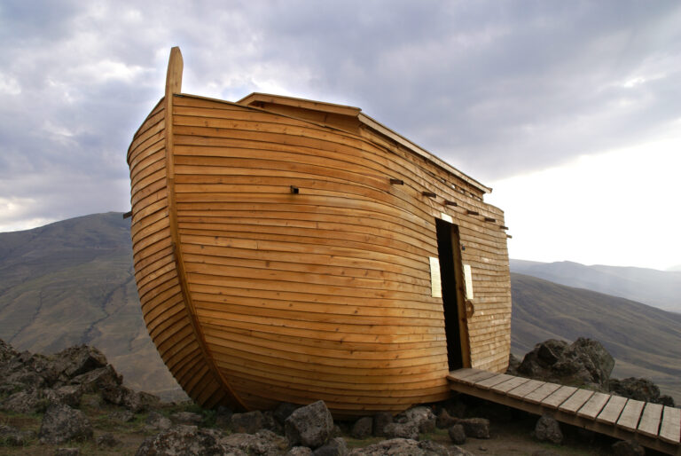 Wooden ark on rocky landscape